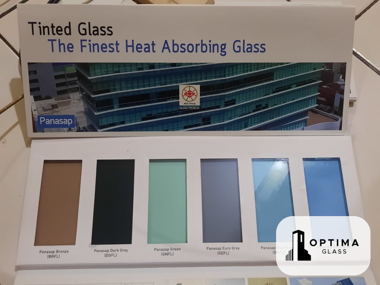 Katalog sample enam warna kaca Panasap Asahimas: Bronze, Dark Grey, Green, Euro Grey, Blue Green, dan Dark Blue di Optima Glass